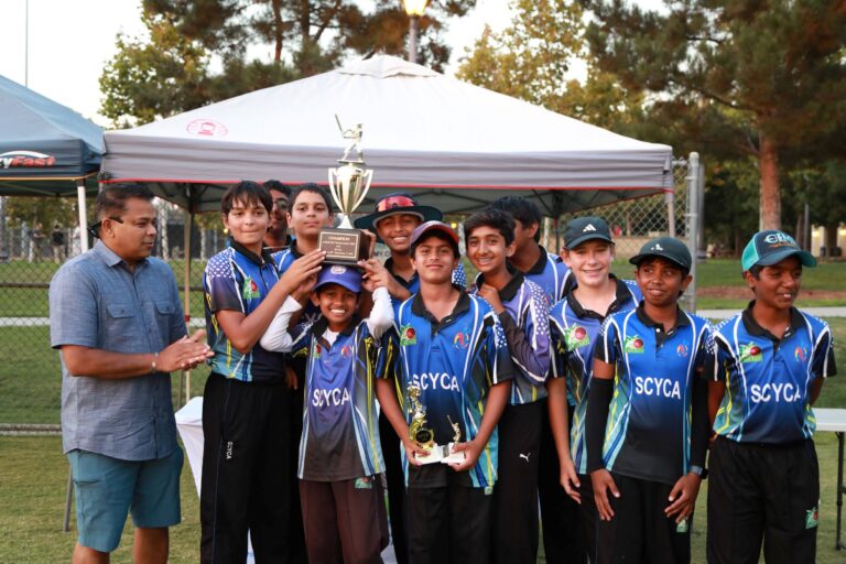 SCYCA U13 Junior Cricket Tournament Champs holding awards